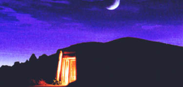 Earth lodge at night
